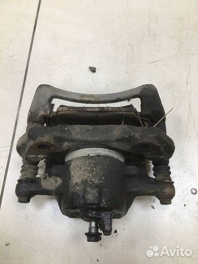 Суппорт передний правый Nissan Primera