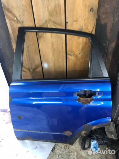 Дверь задняя левая Ssangyong actyon