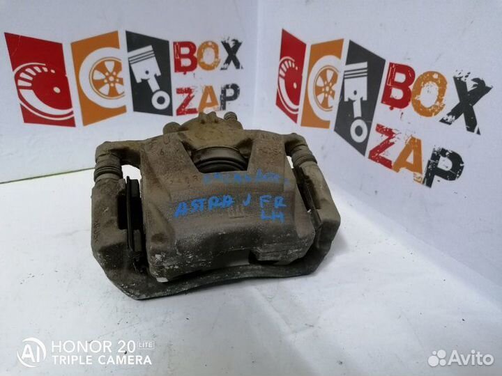 Суппорт тормозной передний левый Opel Astra J 1.4