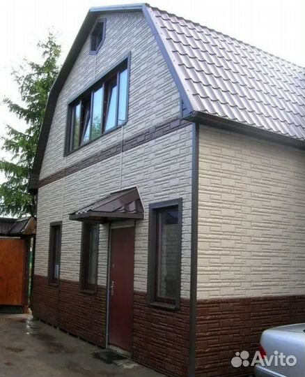 Обшивка фасада дома сайдингом вагонка имитация