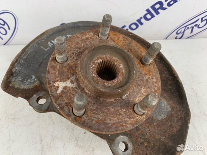 Кулак поворотный передний левый Mitsubishi Lancer