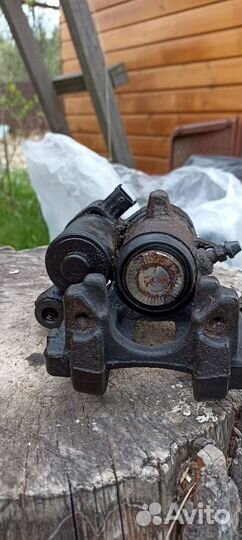 Суппорт тормозной задний левый