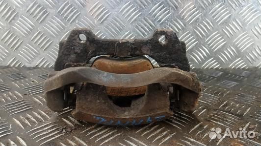 Суппорт тормозной передний левый opel corsa D (2GM14K701)