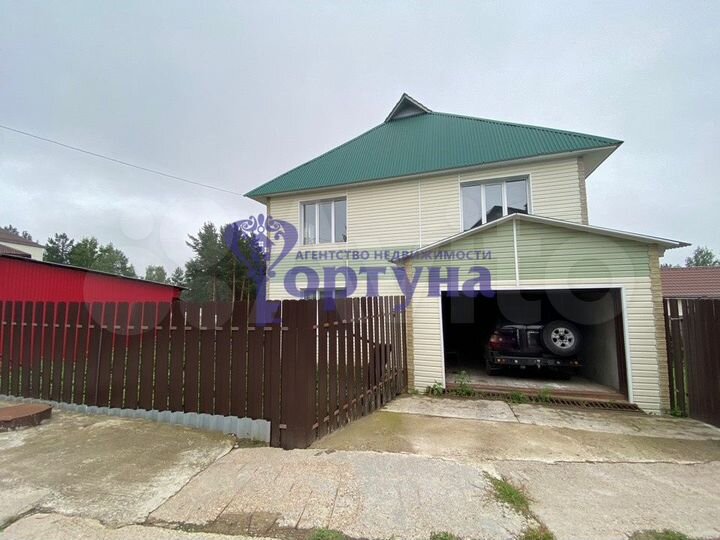 Коттедж 313 м² на участке 11 сот.