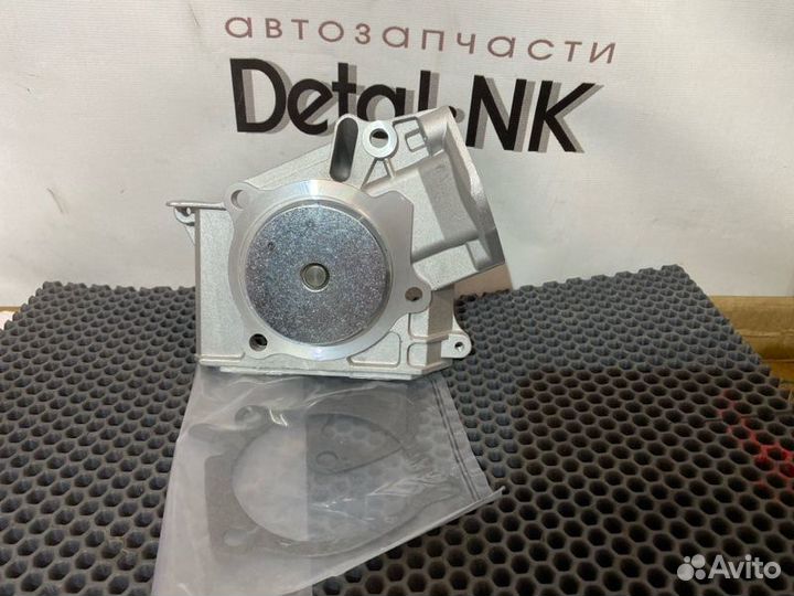 Помпа Mazda Demio DY3W B3-E 2003