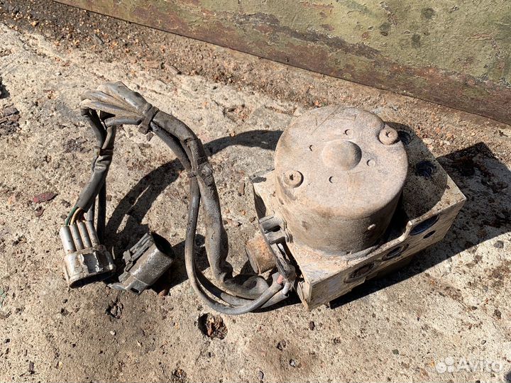 Блок (насос) ABS Nissan Almera N15