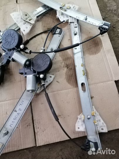 Стеклоподъемник Мазда 2