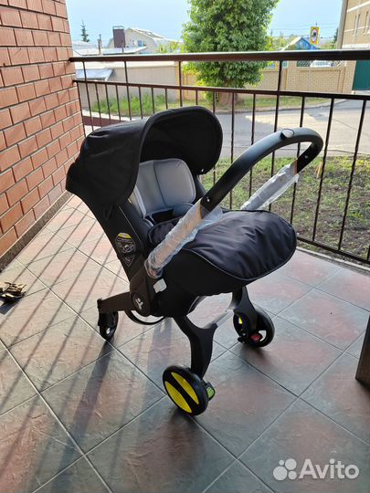 Коляска - автокресло для новорождённых