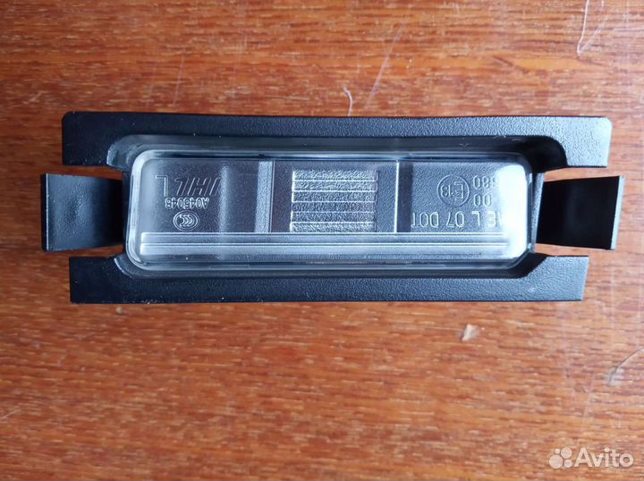 Фонарь подсветки номера kia