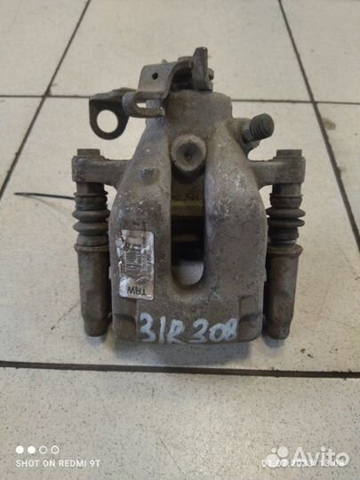 Суппорт тормозной задний правый Peugeot 308