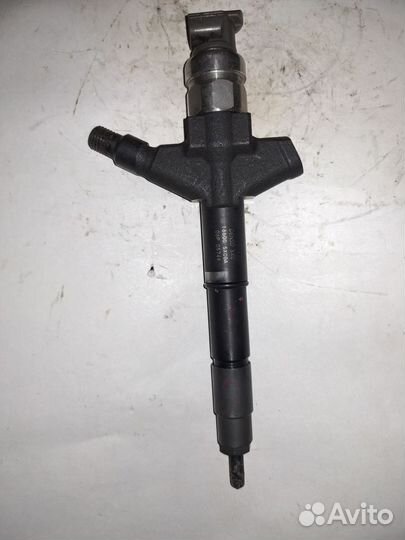 Форсунка Nissan Navara D40 2009-2014 166005X00A