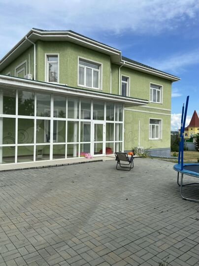 Коттедж 309,8 м² на участке 14 сот.