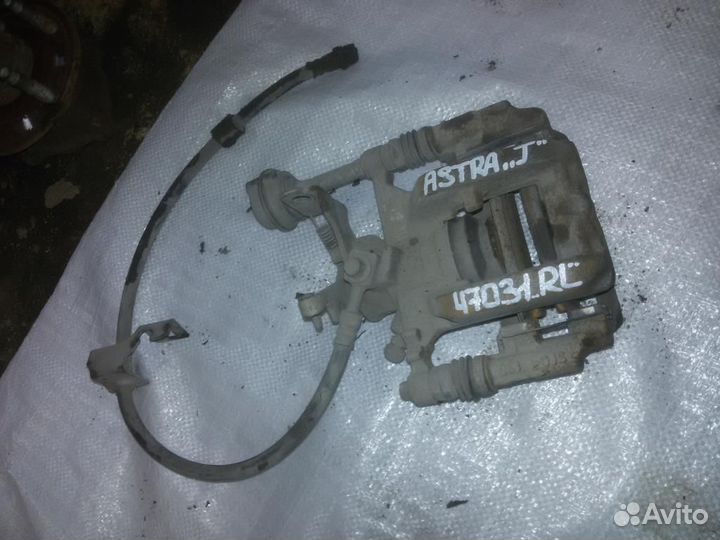 Суппорт Opel Astra J 1.6 A14NET