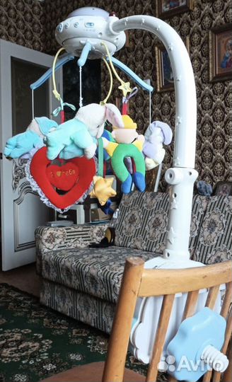 Музыкальная карусель над кроваткой