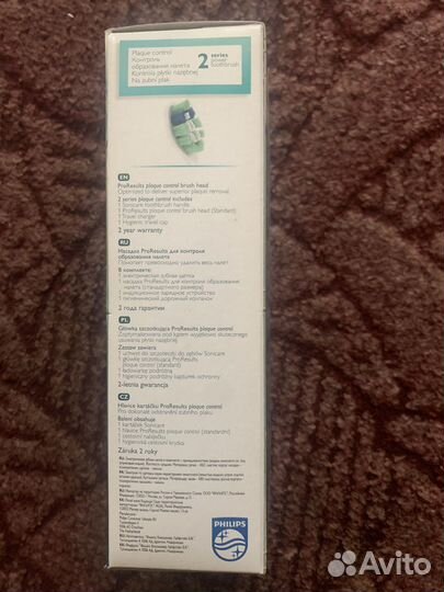 Электрическая зубная щетка