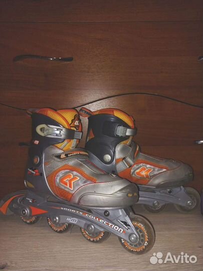 Роликовые коньки