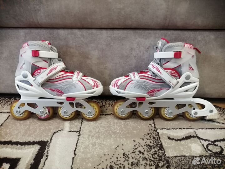 Роликовые коньки