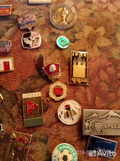Нагрудные значки из СССР