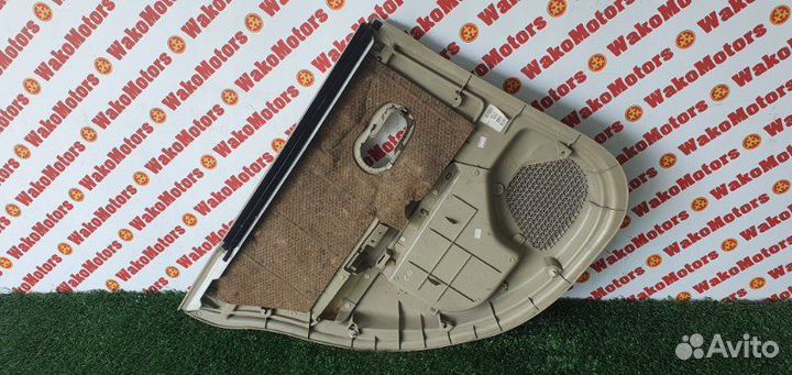 Обшивка боковой двери задняя правая Nissan Tiida