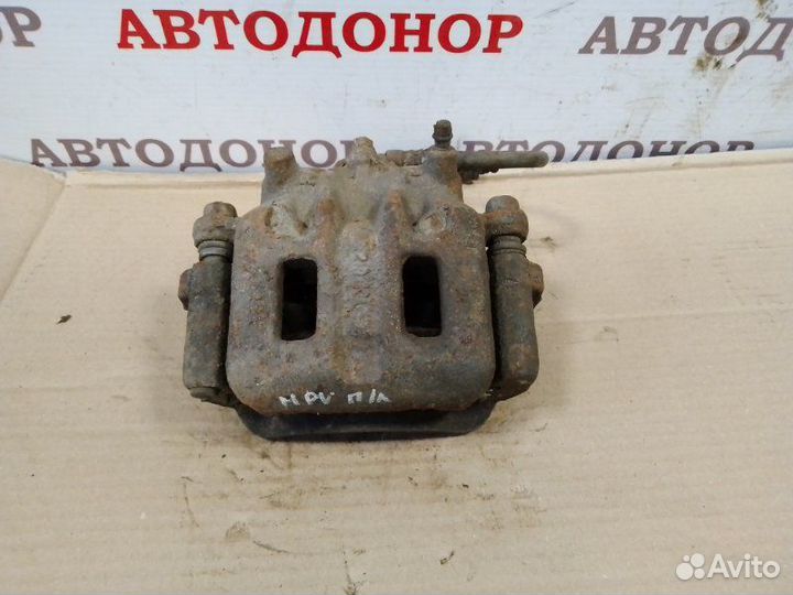 Суппорт тормозной передний левый Mazda Mpv