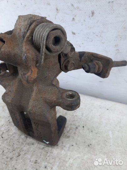 Суппорт тормозной задний левый Honda Civic хэтчбэк