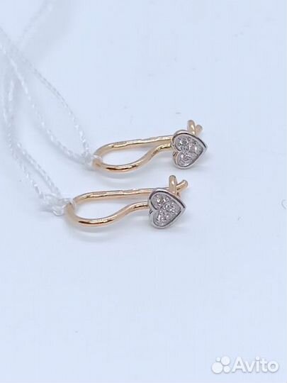 Золотые серьги с камнем