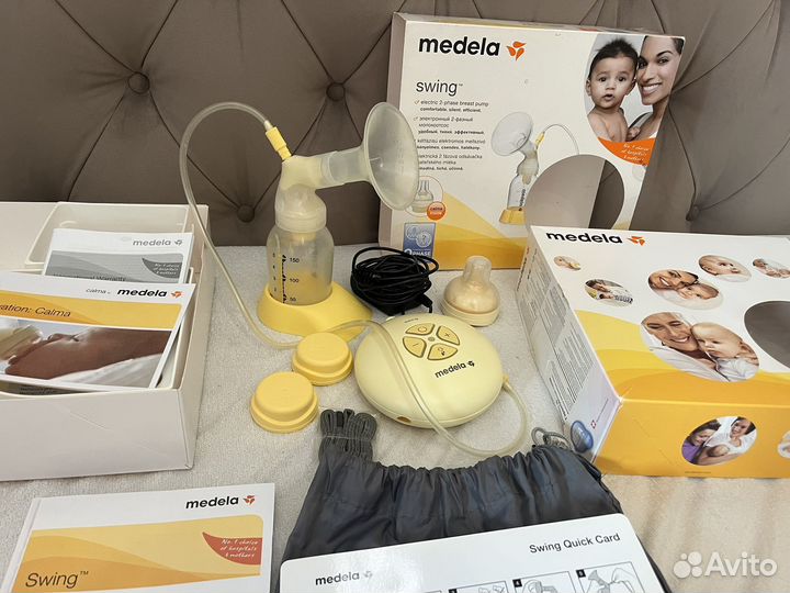 Молокоотсос medela swing электрический