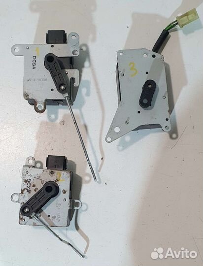 Моторчик заслонки отопителя Kia Spectra