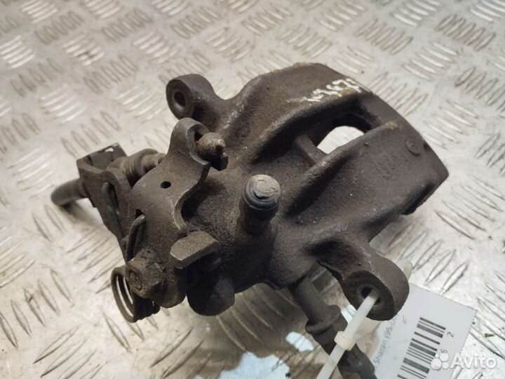 Суппорт задний левый Volkswagen Sharan 95-00