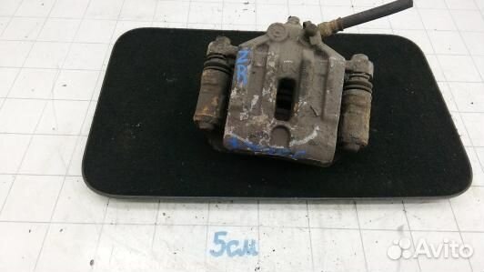 Суппорт тормозной задний правый KIA carens 3 (93E2