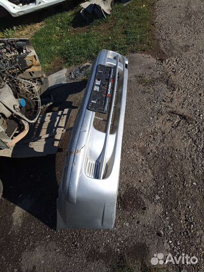 Передний бампер Nissan Almera N15