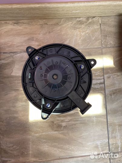 Моторчик отопителя на Опель/Шевроле