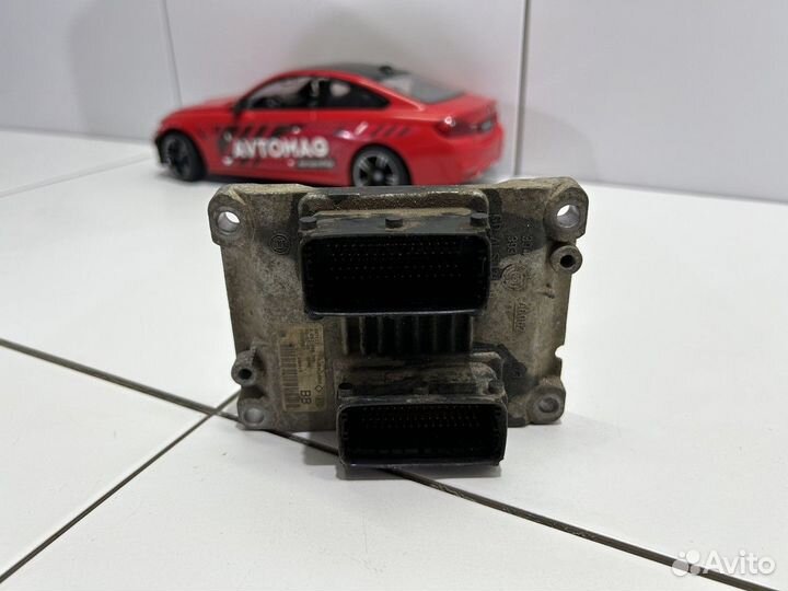 Блок управления двигателем (Opel Astra)