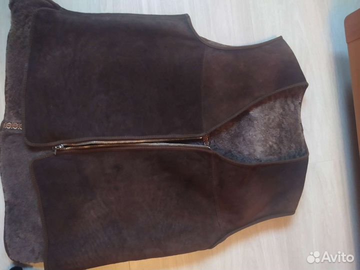 Меховая жилетка