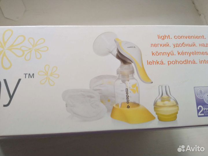 Молокоотсос medela ручной
