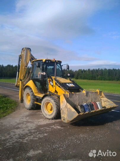 Экскаватор-погрузчик