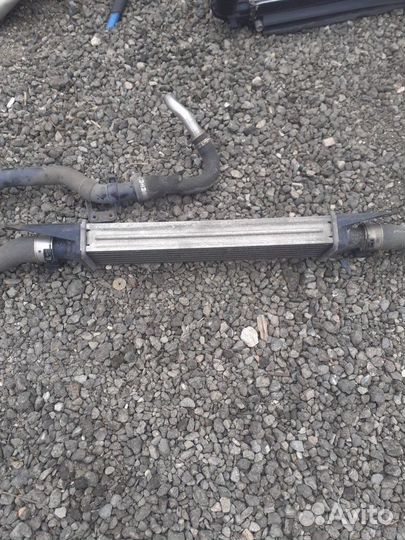 Радиатор интеркулера Opel Corsa D