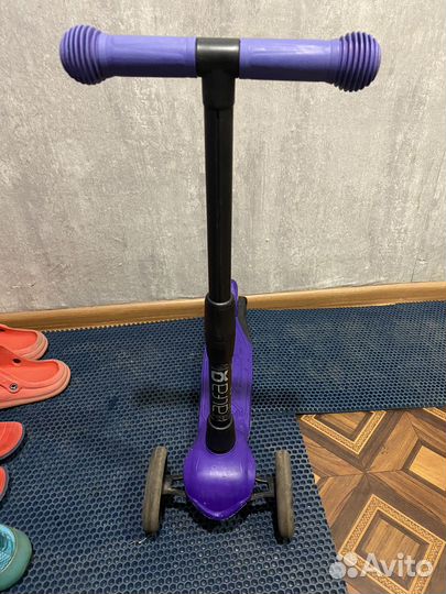 Детский трех колесный самокат