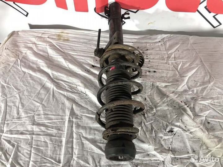 Амортизатор передний левый Skoda Rapid 1 До