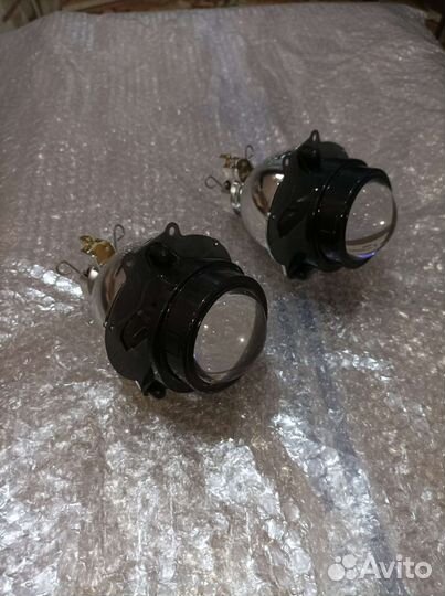 Линзы в фары Mitsubishi Pajero 4