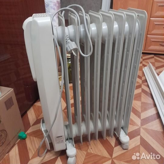 Масляный обогреватель