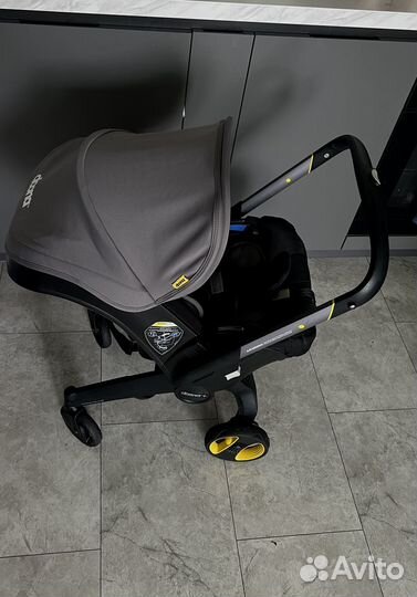 Коляска автокресло doona с базой isofix