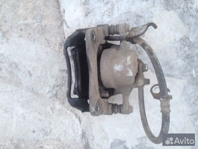 Суппорт передний правый Toyota Corolla E170