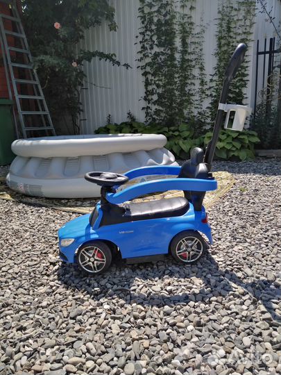 Машина каталка с ручкой