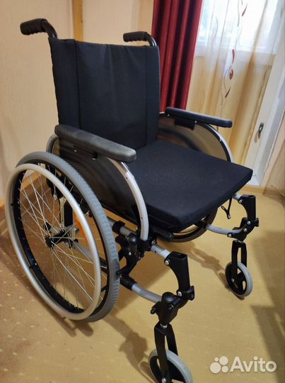 Инвалидная коляска