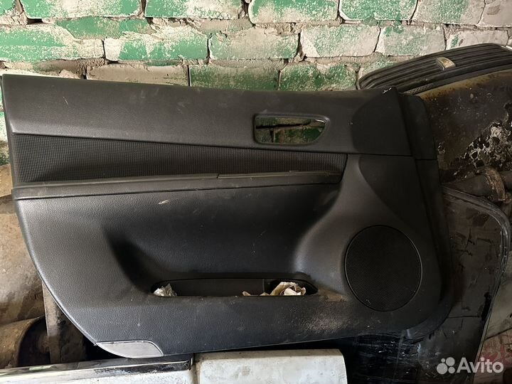 Обшивки дверей мазда 6 gg