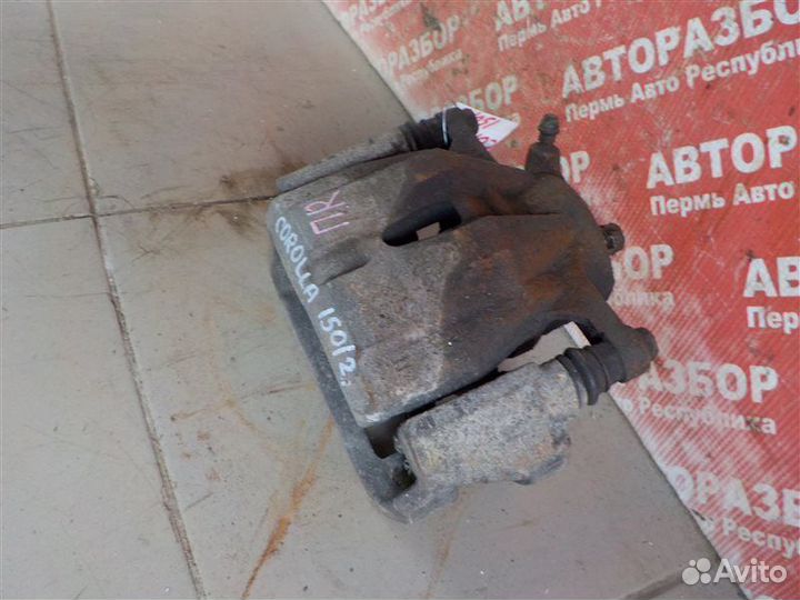 Суппорт тормозной передний правый Toyota Corolla