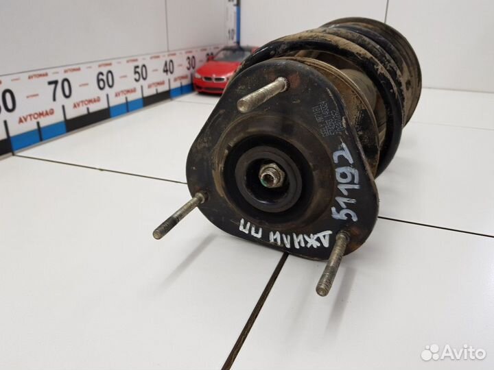 Амортизатор передний правый с пружиной