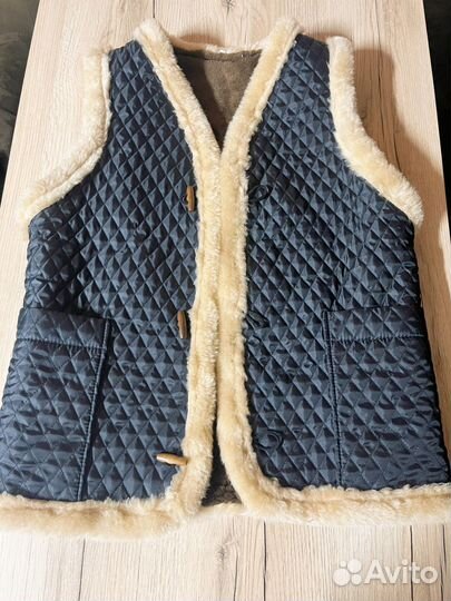 Меховая жилетка