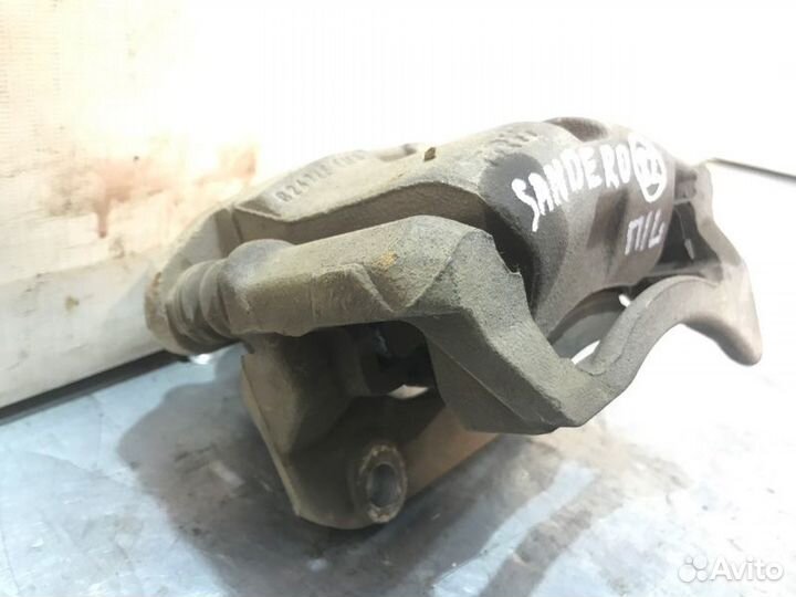 Суппорт тормозной передний левый Renault Sandero